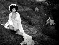 Model on side of rocks